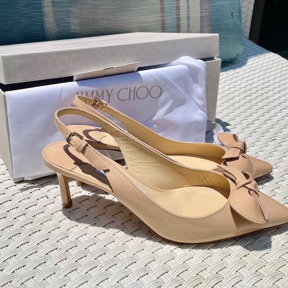 Gucci sling back kitty heels.